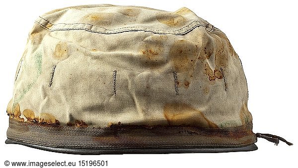 A steel helmet cover for paratroopers in splinter camouflage pattern Cover of imprinted cotton material  the exterior with splinter pattern camouflage and attachment strap for camouflage material  white interior  central size stamping '2'  with strap. Obvious oxidation marks from a helmet. historic  historical  Air Force  branch of service  branches of service  armed service  armed services  military  militaria  air forces  object  objects  stills  clipping  clippings  cut out  cut-out  cut-outs  20th century