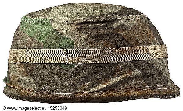 A steel helmet cover for paratroopers in splinter camouflage pattern Cover of imprinted cotton material  the exterior with splinter pattern camouflage and attachment strap for camouflage material  white interior  central size stamping '2'  with strap. Obvious oxidation marks from a helmet. historic  historical  Air Force  branch of service  branches of service  armed service  armed services  military  militaria  air forces  object  objects  stills  clipping  clippings  cut out  cut-out  cut-outs  20th century