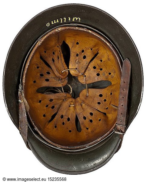 A steel helmet M 40 for Kriegsmarine personnel in late camouflage paint Two-colour camouflage (beneath is the field-grey base paint)  the coat of arms with the golden eagle still distinctly visible  the interior with struck stamp 'ET64' (Thale Iron Works)  '1222' and a handwritten wearer's designation 'Willms'. Complete inner liner with chinstrap. historic  historical  navy  naval forces  military  militaria  branch of service  branches of service  armed forces  armed service  object  objects  stills  clipping  clippings  cut out  cut-out  cut-outs  20th century