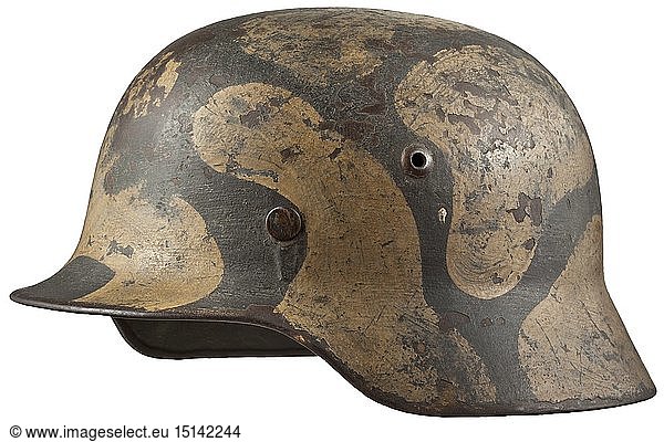 A steel helmet M 35 for members of the coastal artillery The steel skull with separate green and ochre-coloured camouflage paint above the field-grey original paint  complete with inner liner and chinstrap. historic  historical  navy  naval forces  military  militaria  branch of service  branches of service  armed forces  armed service  object  objects  stills  clipping  clippings  cut out  cut-out  cut-outs  20th century
