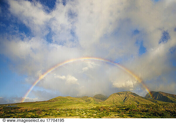 A stunning wide angle view of a full rainbow over the West Maui Mountains above Lahaina Town  Maui  Hawaii  USA; Lahaina  Maui  Hawaii  United States of America