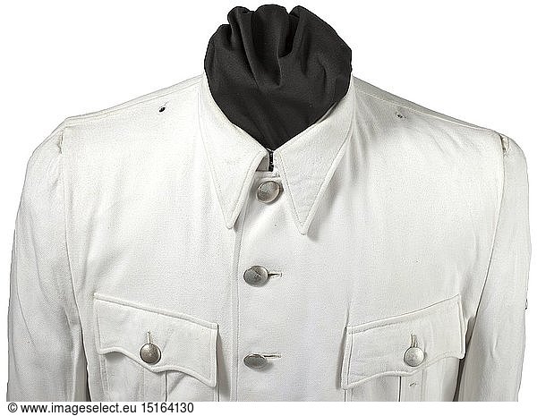 A summer field tunic for leaders of the Waffen-SS Private purchase piece in the cut of the field-grey tunic made of sturdy  lightly napped cotton  nickel-plated buttons on ring fasteners  plug-in slots for the shoulder boards  snap button for the sleeve eagle. historic  historical  20th century  1930s  1940s  Waffen-SS  armed division of the SS  armed service  armed services  NS  National Socialism  Nazism  Third Reich  German Reich  Germany  military  militaria  utensil  piece of equipment  utensils  object  objects  stills  clipping  clippings  cut out  cut-out  cut-outs  fascism  fascistic  National Socialist  Nazi  Nazi period
