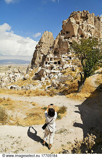 A Tourist Photographs Uchisar Castle; Uchisar  Cappadocia  Turkey