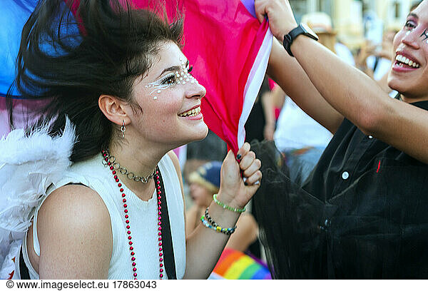 A trans couple enjoying the Gay Pride parade 2022 Madrid