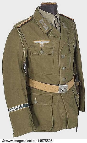 A tropical uniform for a military police NCO.  A white-painted tropical sun helmet with both metal insignia  grey leather trim and chin straps  and red lining. Leather sweatband. Size 57. Traces of wear. An olive-brown linen tunic with field grey buttons attached by rings  supply and size stamps  woven chest eagle on sand-coloured backing  and sand-coloured collar patches. Looped shoulder boards with sand-coloured lace  woven 'Afrikakorps' sleeve band. Shorts of the same material with an integral woven belt  and white lining with supply and size stamps. Olive-brown cotton Italian tropical shirt. Sand-coloured woven belt with aluminium buckle (leather tongue) and woven frog with the 84/98 bayonet. Some pieces only slightly worn. historic  historical  1930s  20th century  Africa  African  corps  branch of service  branches of service  armed service  object  objects  clipping  cut out  cut-out  cut-outs  military  militaria