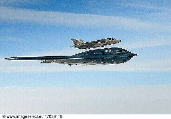 A U. S. Air Force B-2A Spirit assigned to the 509th Bomb Wing at Whiteman Air Force Base  Mo.   and a Royal Netherlands Air Force F-35A Lightning II conduct aerial operations in support of Bomber Task Force Europe 20-2 over the North Sea  March 18  2020. Bomber missions provide opportunities to train and work with NATO allies and theater partners in combined and joint operations and exercises. (U. S. Air Force photo by Master Sgt. Matthew Plew).
