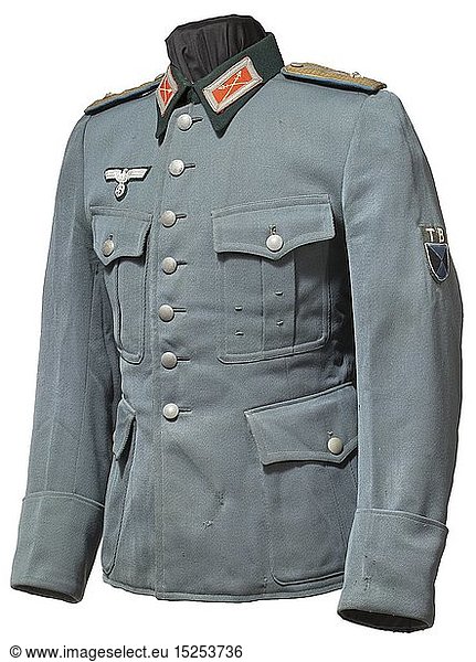 A uniform jacket for an officer of the Terek Cossacks The tunic of light grey cotton material of Dutch manufacture with hand-embroidered national eagle for officers  the collar patches and sleeve insignia hand-stitched. Shoulder boards of Russian pattern with an applied rank star  doubled gold-coloured lace on light blue cloth backing  looped. Green turn-down collar  partial silk inner liner  orders loops for two decorations. With traces of age and usage. Many former Russian army members enlisted in the Wehrmacht from prisoner of war camps  and from Eastern Europe many also volunteered for the Cossack units under General Helmuth von Pannwitz. A rare uniform jacket. historic  historical  cavalry  cavalries  military  militaria  mounted troop  branch of service  branches of service  armed service  armed services  object  objects  stills  clipping  clippings  cut out  cut-out  cut-outs  20th century