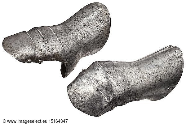 A very rare pair of Italian Gothic mitten gauntlets circa 1430. Probably Milanese  each with short cuff pierced with two lining-holes  the upper surfaces acutely flared towards the rear  shaped for the base of the thumb and extending over the base of the metacarpus  fitted with three articulated plates over the upper metacarpus and the fingers (two replaced on the left gauntlet  the thumb lames missing from each)  and the cuff with a very narrow inward turn over the edge. Length 20 cm. (on the hand) Weight 610 g. Provenance: Sir Edward Barry Bt  Ockwells Manor  Bray. Sidney H.Barnett  Ockwells manor and Claverton Hall  Warwickshire  Sotheby & Co  5th July  1965  part of lot 30 (sold 55 to Welbeck). L.F. McCardle  Sheffield Park  Wallis & Wallis  27th April  1971  part of lot 446 (sold 64). R.T. Gwynn  Christie's  London  Fine Antique Arms and Armour and Books from the R.T. Gwynn Collection  24 April 2001  lot 69 (sold -21 150 Gbp) Literature: Laking  G.F  'Mr Edward Barry's Coll middle ages