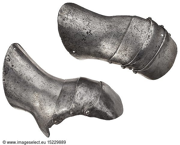 A very rare pair of Italian Gothic mitten gauntlets circa 1430. Probably Milanese  each with short cuff pierced with two lining-holes  the upper surfaces acutely flared towards the rear  shaped for the base of the thumb and extending over the base of the metacarpus  fitted with three articulated plates over the upper metacarpus and the fingers (two replaced on the left gauntlet  the thumb lames missing from each)  and the cuff with a very narrow inward turn over the edge. Length 20 cm. (on the hand) Weight 610 g. Provenance: Sir Edward Barry Bt  Ockwells Manor  Bray. Sidney H.Barnett  Ockwells manor and Claverton Hall  Warwickshire  Sotheby & Co  5th July  1965  part of lot 30 (sold 55 to Welbeck). L.F. McCardle  Sheffield Park  Wallis & Wallis  27th April  1971  part of lot 446 (sold 64). R.T. Gwynn  Christie's  London  Fine Antique Arms and Armour and Books from the R.T. Gwynn Collection  24 April 2001  lot 69 (sold -21 150 Gbp) Literature: Laking  G.F  'Mr Edward Barry's Coll middle ages