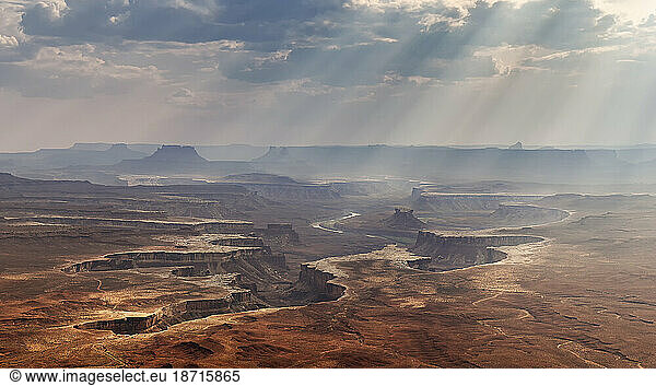 A view of Sunrays streaming into the canyon from Green river overlook