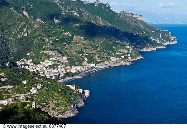 A view of terraced mountainsides and the Amalfi coast town of Minori  Italy