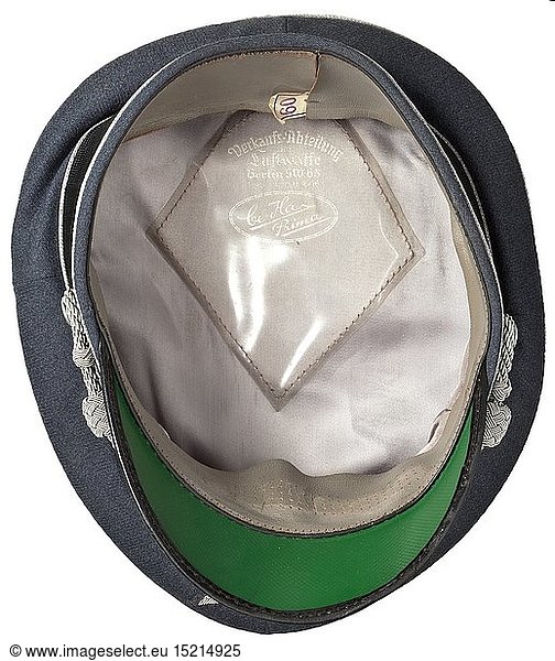 A visor cap for officers of the Luftwaffe issued by the Luftwaffe sales division Fine Luftwaffe-blue cloth  trim band of black mohair  silver officer's braid  grey silk liner with cap trapezoid ('Verkaufsabteilung der Luftwaffe')  grey leather sweatband (still with the original paper tag with size designation '60')  visor with green underlay  hand-embroidered officer's insignia  silver cap cord. In unused condition with minimal storage marks. historic  historical  Air Force  branch of service  branches of service  armed service  armed services  military  militaria  air forces  object  objects  stills  clipping  clippings  cut out  cut-out  cut-outs  20th century