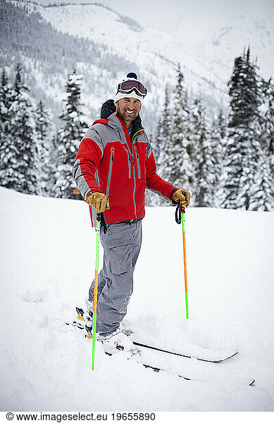 A well-known skier and judge of ski competitions  Jim Jack  stands in fresh powder. Jim was caught in an avalanche in 2012 and was killed in the back country with 3 other skiers.
