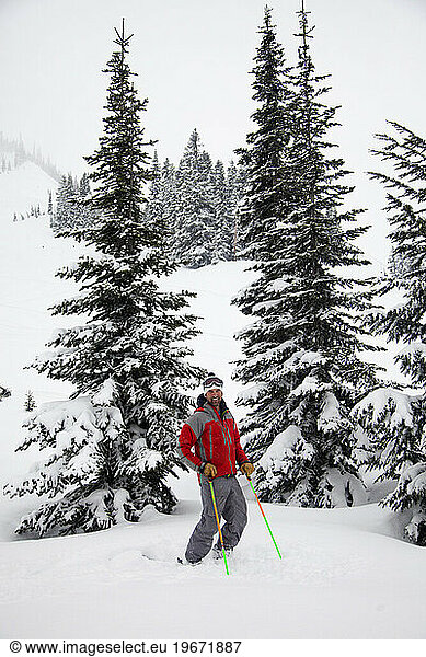 A well-known skier and judge of ski competitions  Jim Jack  stands in fresh powder. Jim was caught in an avalanche in 2012 and was killed in the back country with 3 other skiers.