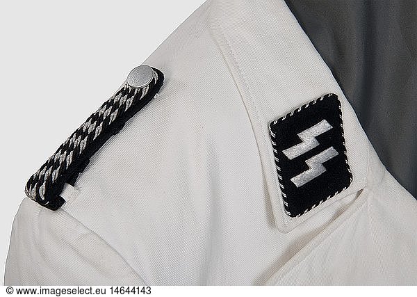 A white jacket for SS Orderlies  A fine white linen  double-breasted jacket with two breast pockets. Sewn  silver metal buttons  white cotton lining. Black collar patches with silver-embroidered runes and black/silver trim. Snap attachments. Slip-on shoulder board of black/silver cord on black backing. Large size. Comes with five photographs of the wearer. Cf. Beaver  Uniforms of the Waffen SS  vol. II  p. 607  historic  historical  1930s  1930s  20th century  Waffen-SS  armed division of the SS  armed service  armed services  NS  National Socialism  Nazism  Third Reich  German Reich  Germany  military  militaria  utensil  piece of equipment  utensils  object  objects  stills  clipping  clippings  cut out  cut-out  cut-outs  fascism  fascistic  National Socialist  Nazi  Nazi period  uniform  uniforms  clothes  outfit  outfits  textile