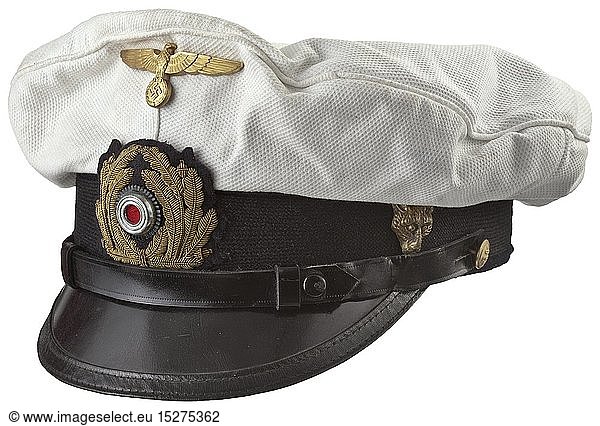 A white visor cap for non-commissioned officers of the Kriegsmarine Black mohair trim band  the hand-embroidered cap wreath with metal cockade  black patent leather strap  blue silk liner  white changeable cover with gilt aluminium eagle. The left side with a wolf's head as 'Maling' in gilt sheet brass. historic  historical  navy  naval forces  military  militaria  branch of service  branches of service  armed forces  armed service  object  objects  stills  clipping  clippings  cut out  cut-out  cut-outs  20th century