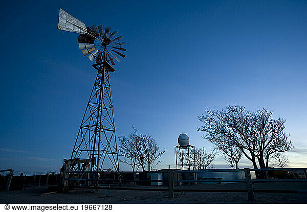 A windmill pumps water to livestock on a Mexican ranch in Chihuahua.
