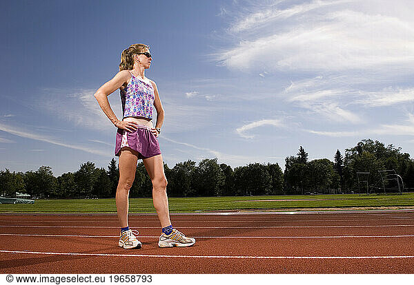 A woman getting ready to run on the track in Fort Collins  Colorado.