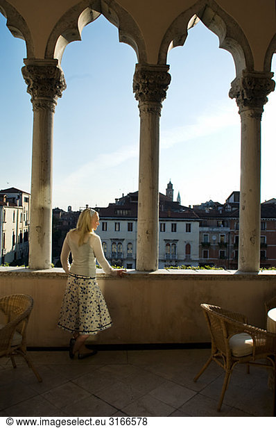 A woman in a Venetian palace Vencis Italy.