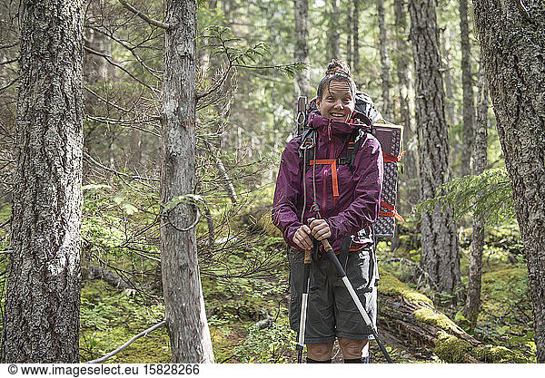 A woman in the forests of North Cascades National Park