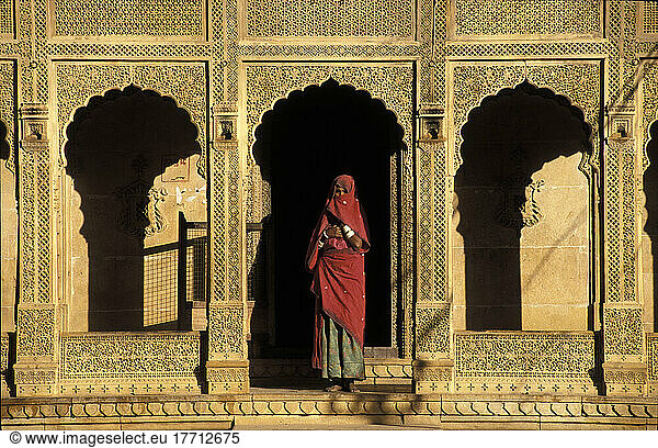 A Woman Standing Under A Gold Archway; Rajasthan  India