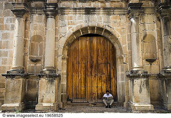 A wooden door at The ruins of Las Capuchinas convent  Antigua  Guatemala