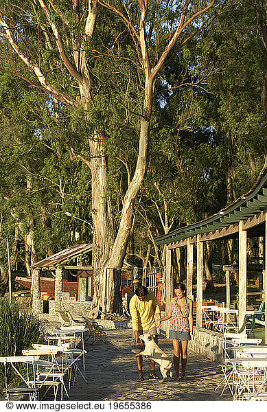 A young couple taking a walk in Carmelo  Uruguay.