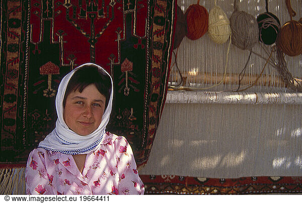 A young female carpet weaver at Etrim village  Turkey