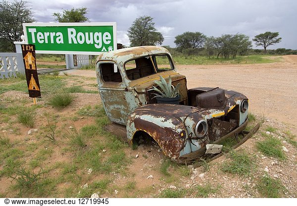 Abandoned car at the door of Terra Rouge  small lodge and tented camp  15 km before of Mata Mata gate  entrance door to Kgalagadi Transfrontier Park from Namibia.