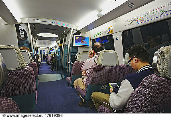 Aboard the Airport Express train  en route to the Hong Kong International Airport  Hong Kong.; Hong Kong.
