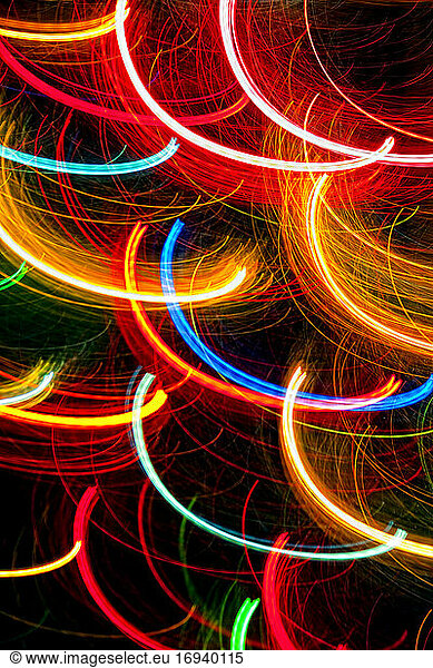 Abstract light trails on dark background.