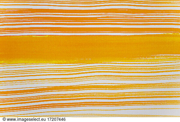 Abstrakte orange Linien Aquarellmalerei auf weißem Papier