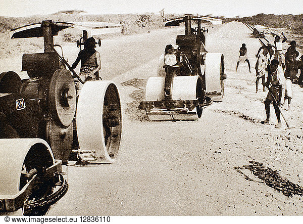 ABYSSINIAN CAMPAIGN  1936. Italian military operations in Ethiopia. Ethiopian laborers at work on a new road that enables Italian troops under General Rodolfo Graziani to launch attacks on the Harrar District in early 1936.