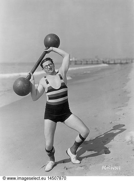 Actor Harry Green  Publicity Portrait Lifting Barbell on Beach  early 1930's