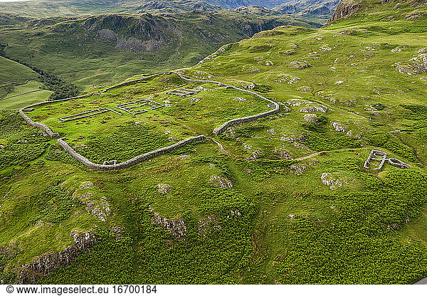 Aerial of Hardknott Roman Fort is an archeological site  the remains of the Roman fort Mediobogdum  located on the western side of the Hardknott Pass in the English county of Cumbria