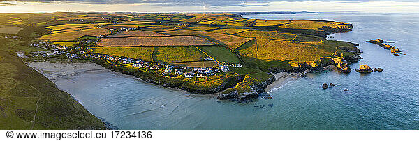 Aerial panorama of Porthcothan Bay and rugged Cornish coastline at dawn  Cornwall  England  United Kingdom  Europe
