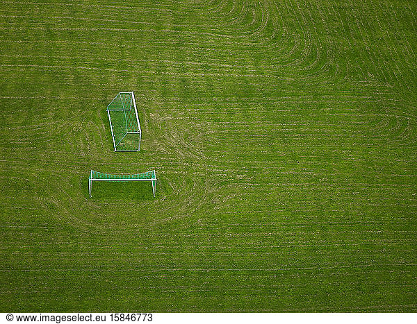 Aerial shot of football goals on an empty field