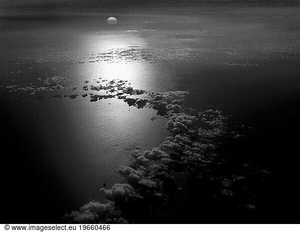 Aerial shot of sunset over the ocean