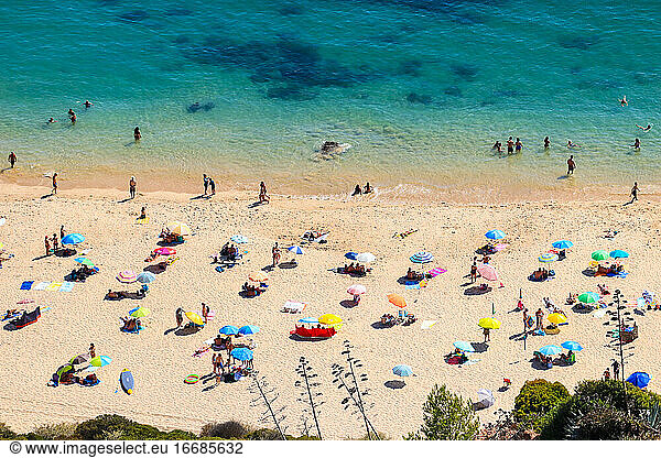 Aerial view from a Tropical beach with colorful umbrellas.