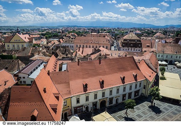 Aerial view from Council Tower on a historical buildings on Large Square (with Weidner-Reussner-Czekelius House) of Historic Center of Sibiu  Romania.