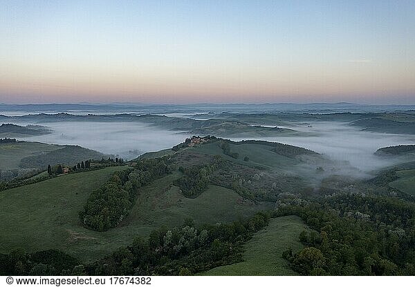 Aerial view  Hilly landscape with fog  Sunrise  Crete Senesi  Province of Siena  Tuscany  Italy  Europe