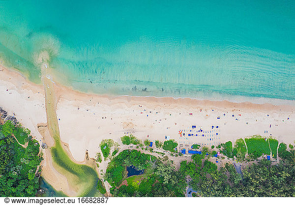 Aerial view of beautiful tropical beach and sea with palm and ot
