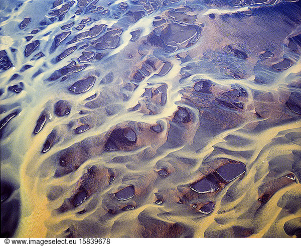 Aerial view of braided orange rivers in southern Iceland