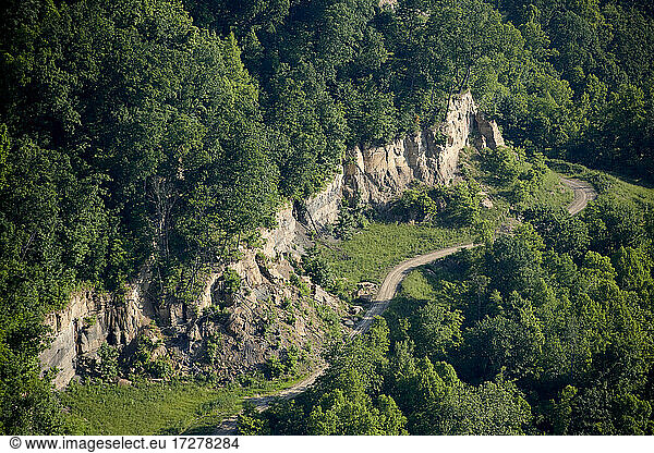 Aerial view of dirt road in Appalachian forest