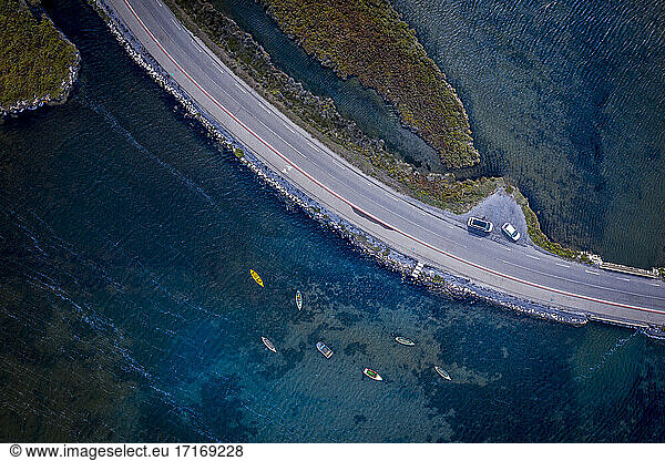 Aerial view of highway stretching along bank of Rhone river