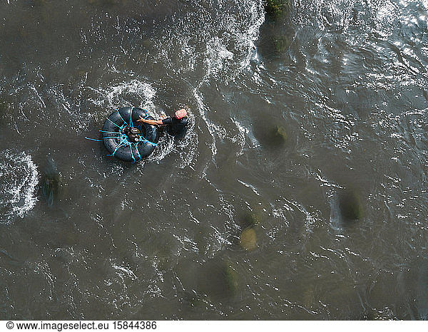 Aerial view of man in river