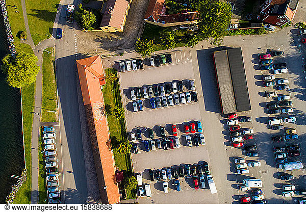 Aerial view of parking space and scandinavian houses in summer