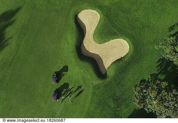 Aerial view of players at golf field