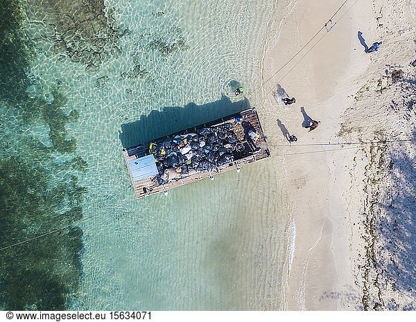 Aerial view of pontoon transporting garbage at Gili Islands  Bali  Indonesia
