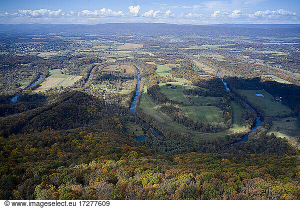 Aerial view of river winding in George Washington and Jefferson National Forests during autumn